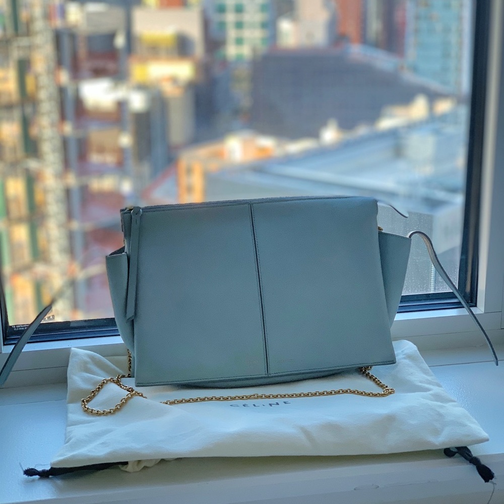 Celine tri-fold clutch on chain in cloud calfskin